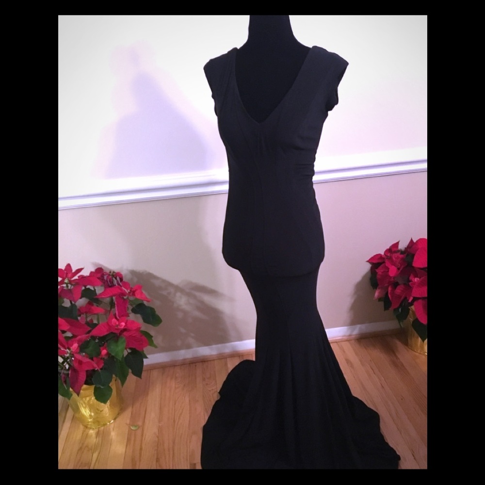 Long, black dress-size 2. Ended up wearing a different dress for my event.